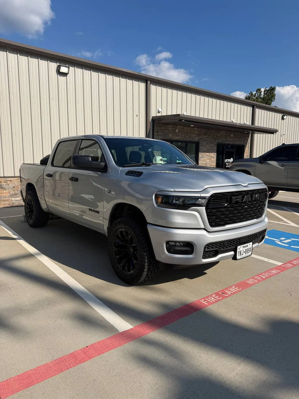 2026 Ram 1500 with a 2 inch leveling kit at Lift Pro Customs in Willis, TX