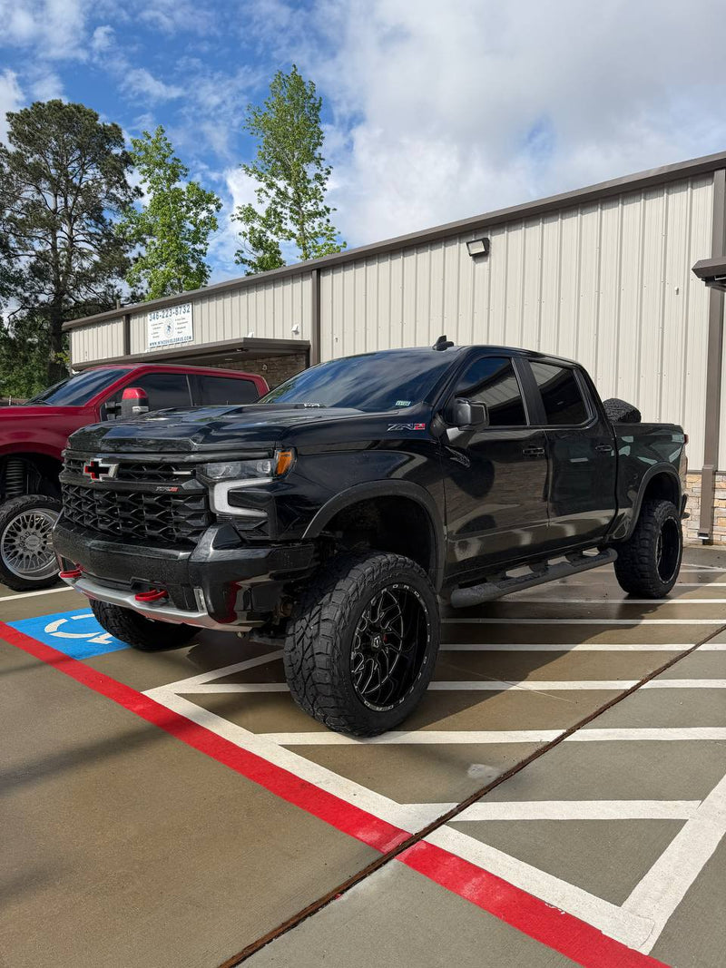 Chevy 1500 4" lift with wheels and tires — Lift Pro Customs, Willis TX