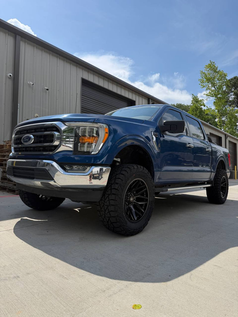 Ford F-150 6" Rough Country lift with wheels and tires — Lift Pro Customs, Willis TX