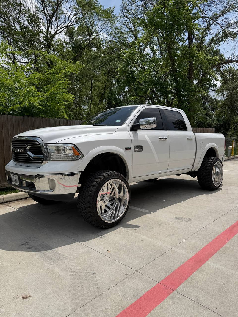 RAM 1500 lift with wheels and tires — Lift Pro Customs, Willis TX