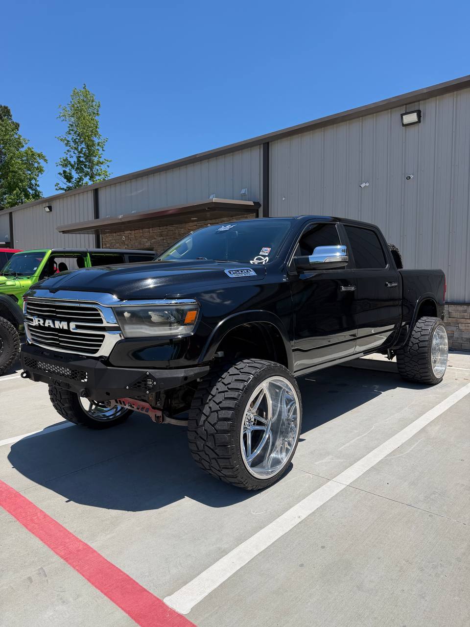 Ram 1500 Lift + Wheels + Tires + Powdercoat — photo 1 of 6 — installed by Lift Pro Customs, Willis TX