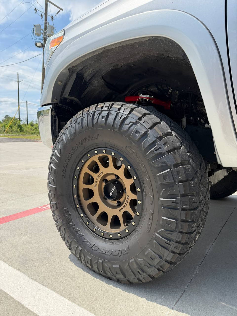 Toyota Tundra lifted, rear view — Lift Pro Customs, Willis TX